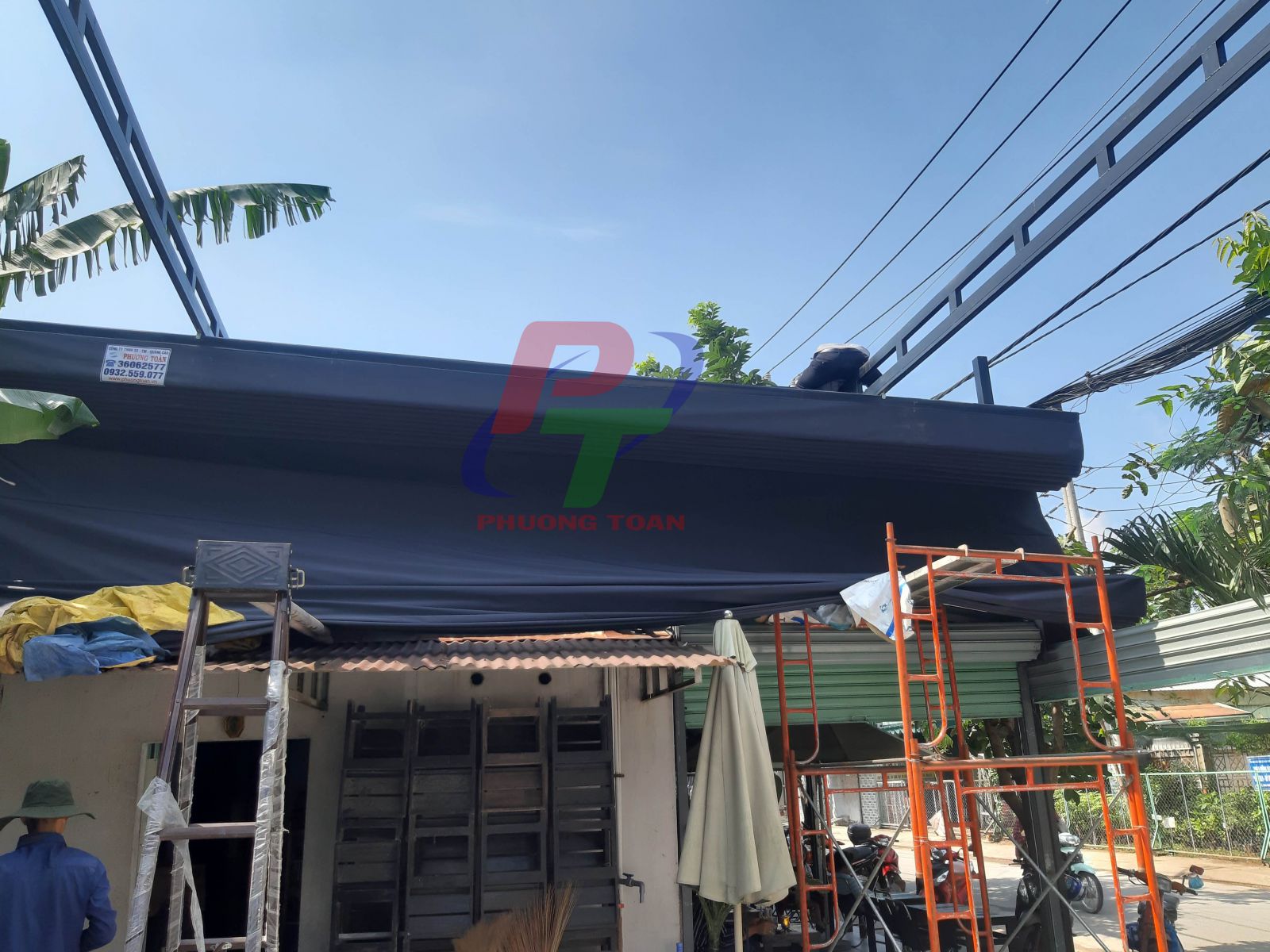 Làm mái xếp kéo tay giá rẻ